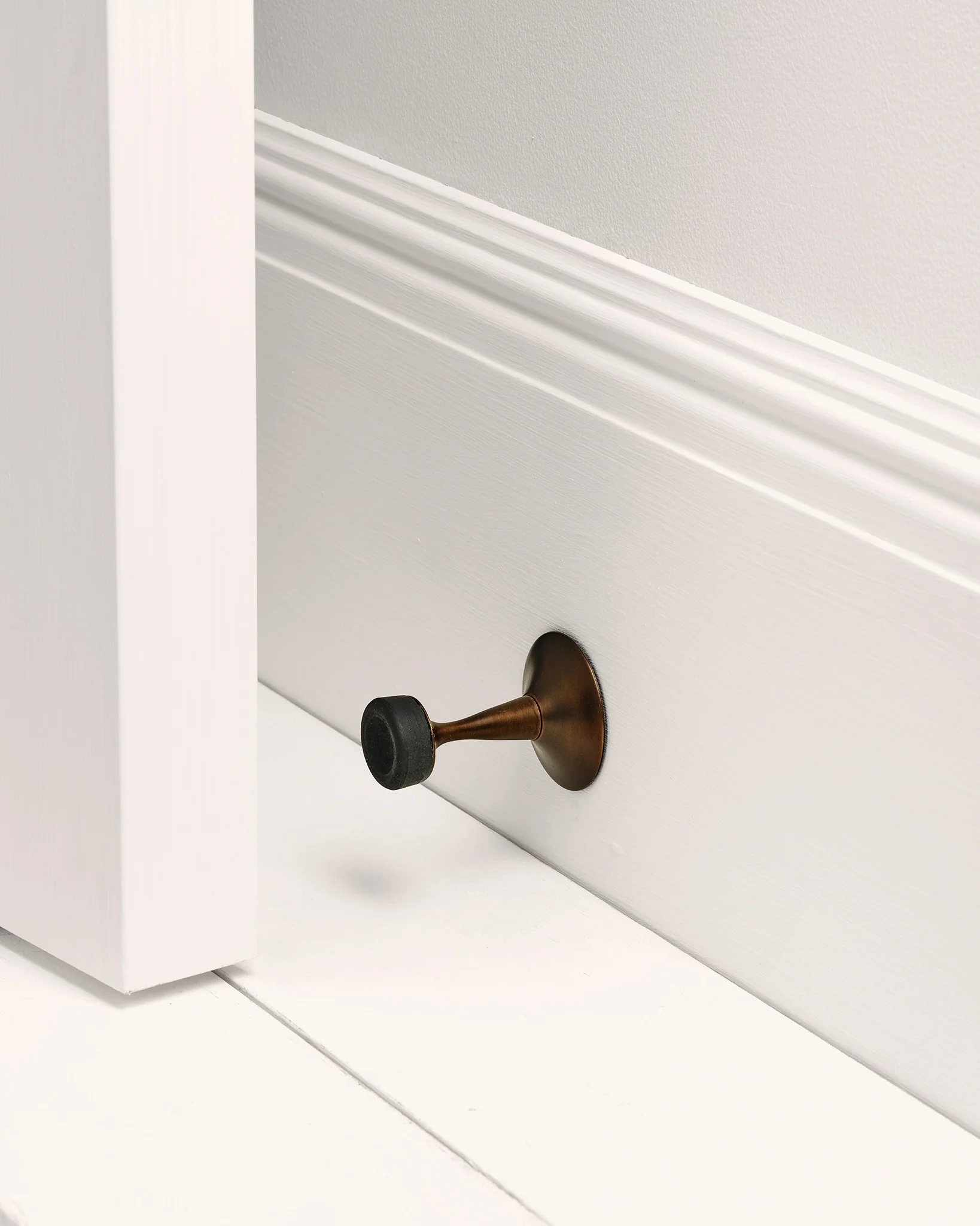Wall Door Stop, Blackened Bronze